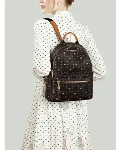 Women stylish casual monogram PU leather backpack with top handle and front zip pocket.