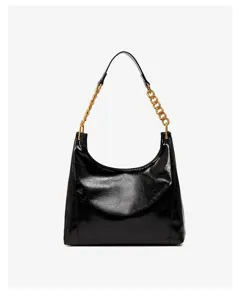 Detailed view of the black shiny hobo shoulder bag featuring gold chain strap and patent leather.
