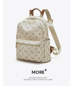 Detailed view of the stylish monogram pattern women backpack with zipper pockets and handle.