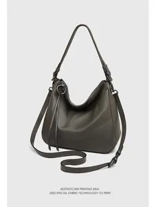 Genuine leather hobo shoulder bag for women, large capacity commuter crossbody handbag.