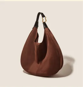 Brown suede hobo shoulder bag for women, large capacity retro underarm handbag with chic hardware.