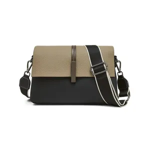 Stylish women's leather crossbody shoulder bag with chic color block design and wide strap.