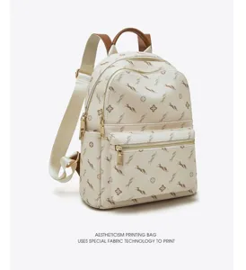 Stylish women fashion casual backpack with luxury monogram print pattern and durable zip design.