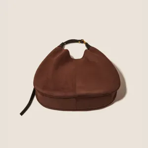 Brown suede shoulder bag for women, retro slouchy hobo handbag with dark leather strap.