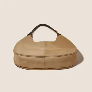 Women khaki suede shoulder bag retro hobo saddle bag elegant underarm crossbody bag for spring.