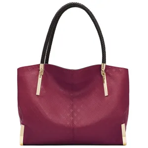 Elegant women large capacity leather tote bag with braided handles and chic gold hardware.