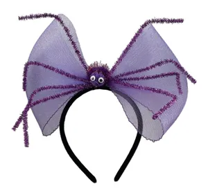 Detalle de diadema de araña de tul de Halloween, accesorio de pelo morado brillante.