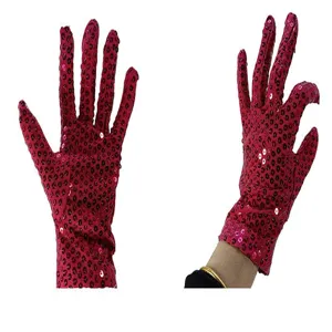 Red sequin gloves detail view, sparkling stage performance party dance costume accessory.