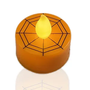 Halloween LED tea light candle with spider web design, perfect for party decor detail view.