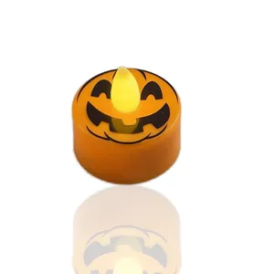 Halloween pumpkin LED electronic candle night light, cute glowing jack-o'-lantern party decor.