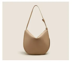 Detailed view of the casual soft leather hobo shoulder bag, elegant curve and fine strap.