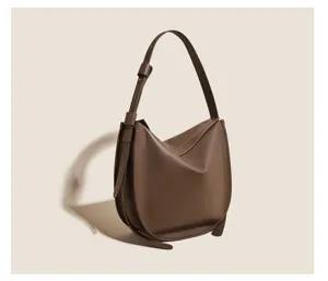 Brown soft leather hobo shoulder bag with large capacity for casual daily commuting.