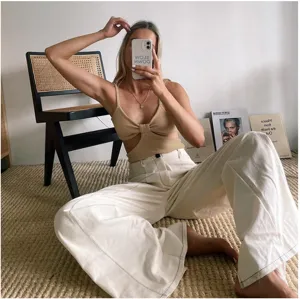Stylish women summer casual camisole crop top with chic hollow back and elegant wide leg pants.