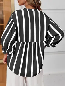 Black and white striped casual blouse with puff sleeves, back view product detail.