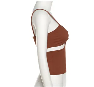 Side view detail of brown ribbed camisole, slim fit design with stylish cutout for women.