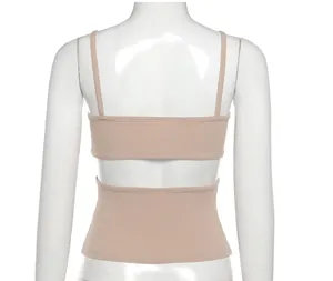 Backless ribbed crop top detail showcasing the cutout design and slim fit knit texture.
