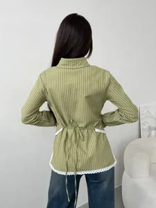 Green striped long sleeve shirt back detail featuring cinched waist tie and white lace hem.