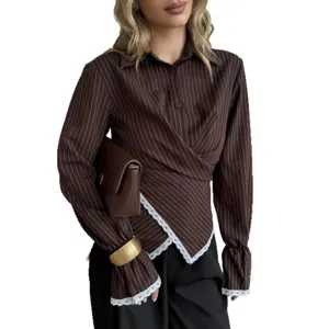 Elegant brown pinstripe long sleeve blouse with crossover waist and delicate white lace trim.