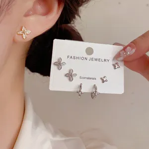 French light luxury zircon star stud earrings and hoop set, delicate daily commute jewelry.