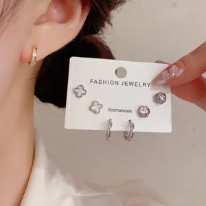 Exquisite four leaf flower petal earring set fashion jewelry detailed design chic sweet style.