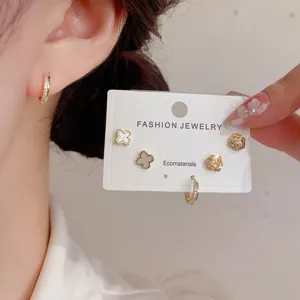 Exquisite four-leaf clover and rose stud earrings set, fashionable gold tone alloy jewelry.