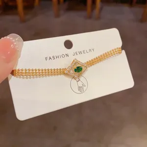 Bracciale in metallo zircone diamante di lusso francese, dettaglio catena perle.