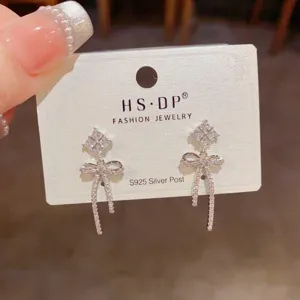 Erhöhte 925er Silber Nadel Zirkon Diamant Schleife Ohrringe, glänzender Modeschmuck für Frauen