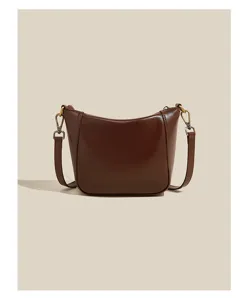 Genuine leather shoulder bag for women, retro brown oil wax crossbody handbag detail view.