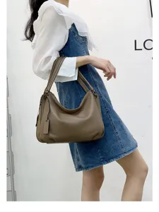 Genuine leather shoulder bag for women, casual brown hobo handbag, stylish daily crossbody bag.
