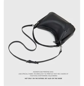 Black leather hobo shoulder bag for women, versatile crossbody purse with adjustable strap.