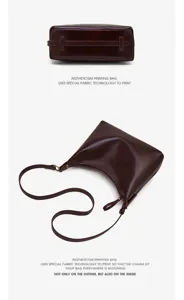 Detailed view of dark brown leather shoulder bag, premium texture, metal hardware and strap.