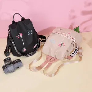 Fashionable embroidered women backpack casual daily travel school bag with spacious compartments.