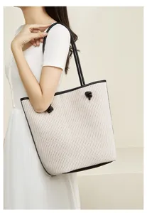 Large capacity woven shoulder tote bag for women, stylish commute handbag with knot handles.
