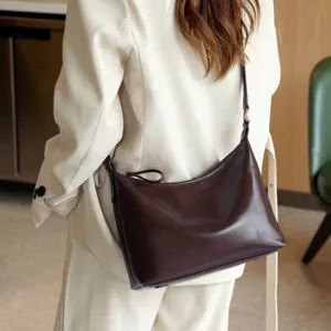 Stylish brown underarm shoulder bag for women, large capacity casual commuting crossbody.