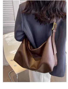 Brown leather hobo shoulder bag for women, soft large capacity tote crossbody bag casual style.