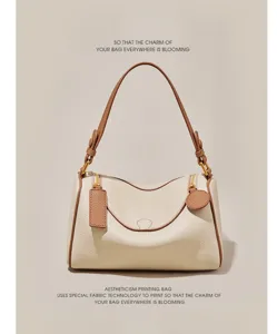Beige brown fashion Boston bag, premium leather shoulder handbag with exquisite hardware.