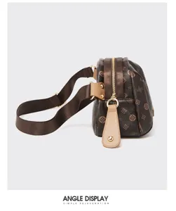 Brown monogram crossbody shoulder bag with adjustable strap and chic vintage design for women.