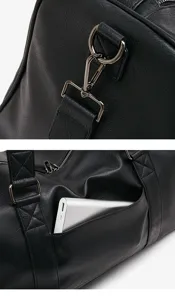 Close-up detail of men's business travel duffel bag showcasing metal hardware and side pocket.