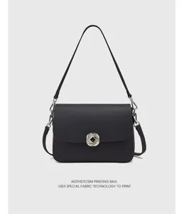 Discover this elegant black leather shoulder bag, stylish underarm design for modern women.