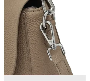 Detailed view of the premium leather women's shoulder crossbody bag hardware and texture.