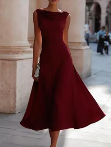 Chic sleeveless cowl neck midi dress detail showcasing the elegant draped neckline and pleated waist.