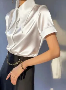 Elegant white satin short sleeve blouse for women, featuring a chic large pointed collar.