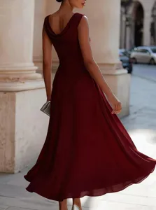 Detailed view of the elegant burgundy cowl neck sleeveless midi dress with swing hem.