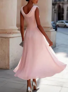 Detail view of a pink sleeveless cowl neck midi dress featuring a fitted waist and flared hem.