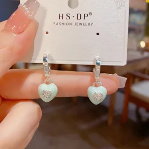 Fresh light luxury thick silver dripping oil heart earrings, sweet and versatile design detail.