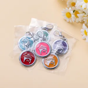 Colorful metal pet ID tags with lobster clasps, cute dog house design in clear bags.
