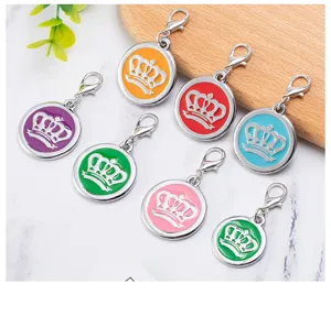 Zinc alloy crown pet ID tag detail showing colorful enamel and lobster clasp pendant.