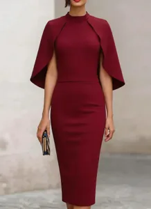 Burgundy cape midi dress detail showing the elegant mock neck, cape sleeves and slim fit.