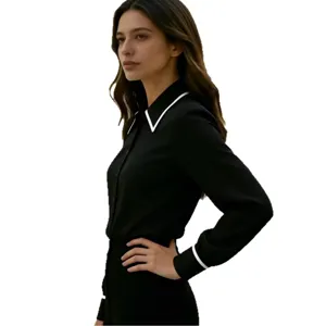 Women's black long sleeve shirt with contrast white lapel collar and cuffs main view