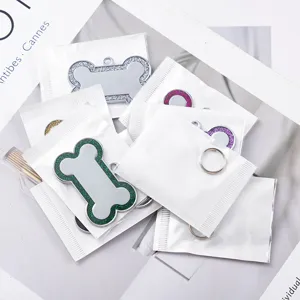 Zinc alloy dog ID tags, bone shaped glitter edge pet metal pendants for anti-lost pets.